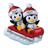 2 Penguin On Red Sled Ornament